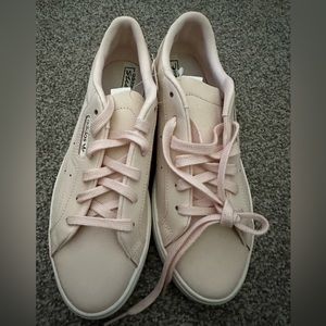 Brand new with tags light blush pink Adidas.  Size 7.5
